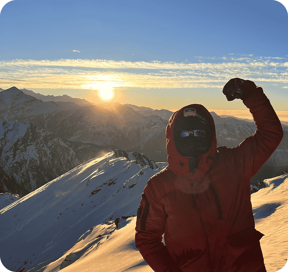 Person at sunset on mountain